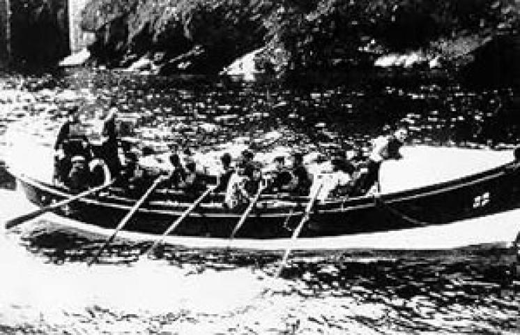 RYDER - being rowed back to Looe, date unknown.  Starboard side.