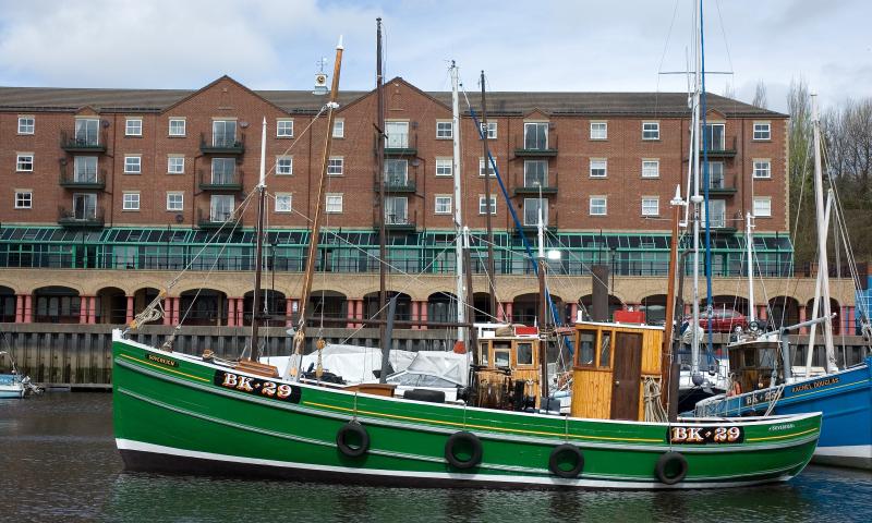 Sovereign - in St Peters Marina, having undergone extensive restoration.  Port side view.