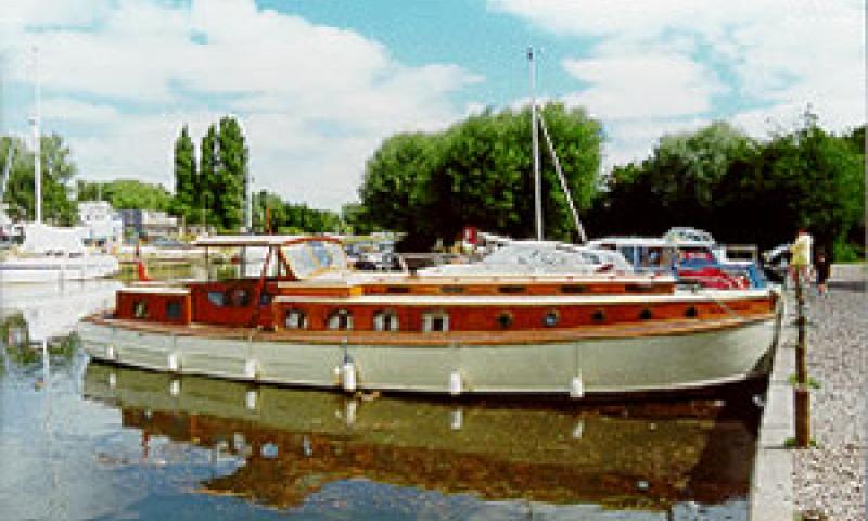 PRINCE OF LIGHT - at mooring. Starboard side. The wheelhouse side is dropped on 'sash window' type weights.