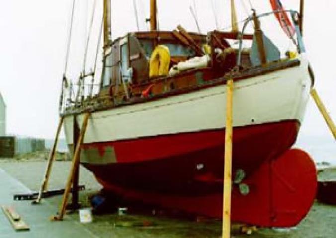 ROS BHAN - hauled out for repainting. Stern from port quarter looking forward.