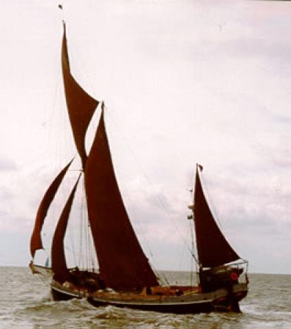 THISTLE - under sail racing in 1997.  Port side.