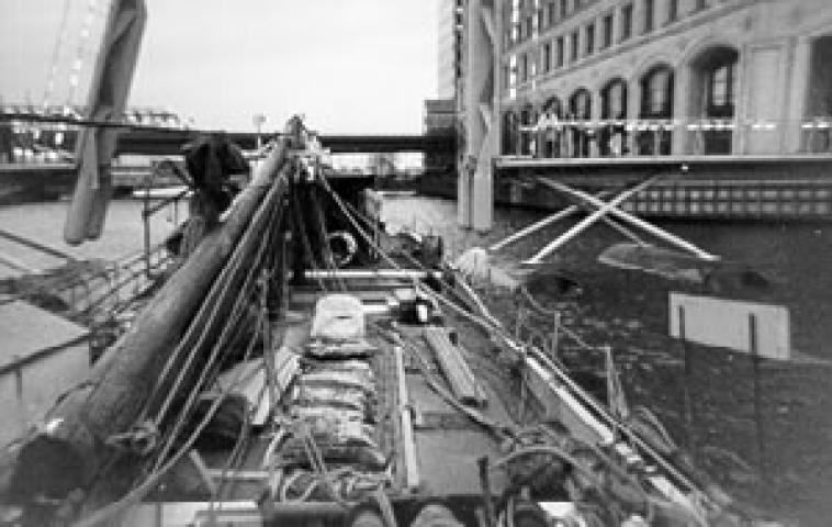 THISTLE - with rig lowered passing under bridges on the Thames in 1997.