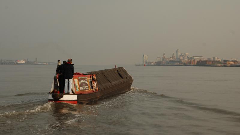 Swallow crossing the Mersey from Eastham to Liverpool to attend the Spring on the Waterfront festival - Photo Comp 2011 entry