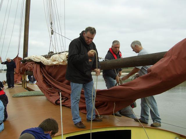 Phyllis - stowing the mainsail