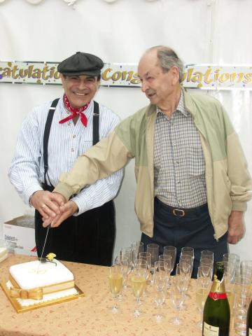 RAYMOND 50th birthday celebration: David Suchet and Aubrey Berriman (who built the boat) cut the cake