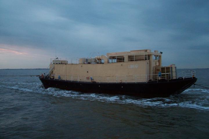 LBK6 on tow, stern quarter, starboard side