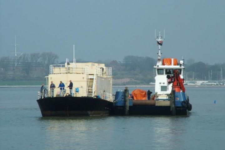 LBK6 bow view with tug alongside