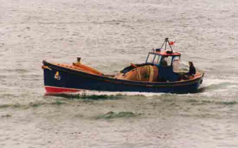 Lucy Lavers - as a dive boat on her way to be stripped for the restoration of HOWARD D