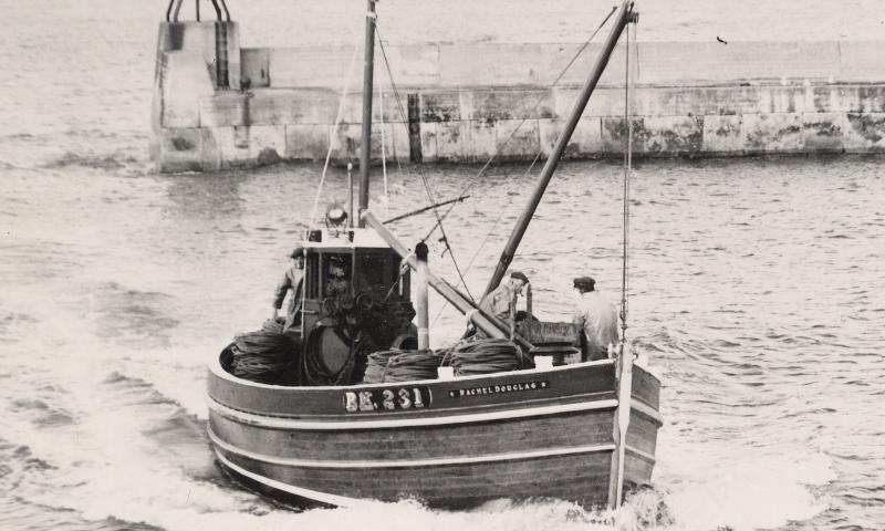 Entering Seahouses Harbour about 1950
