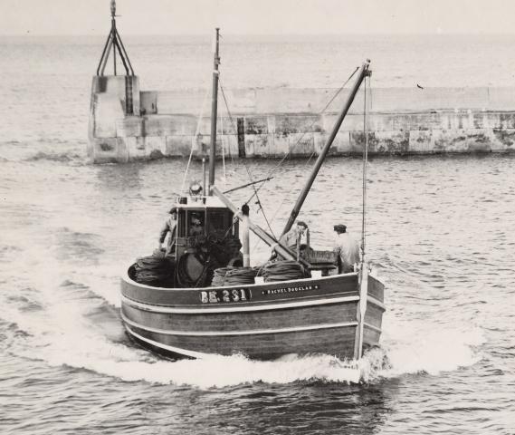 Entering Seahouses Harbour about 1950