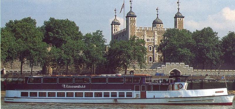 Viscountess - starboard side view, taken from the promotional brochure.  Shows Viscountess on the Thames outside the Tower of London.