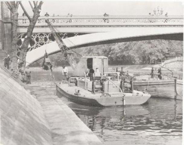 Being towed under a bridge