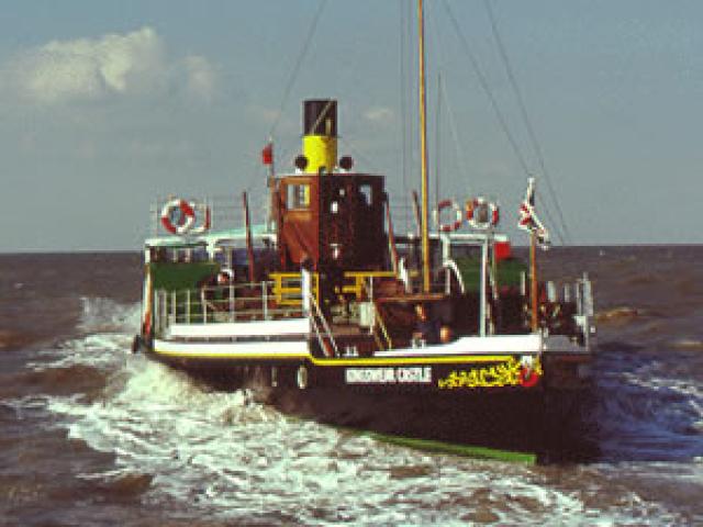 KINGSWEAR CASTLE - underway. Bow from starboard quarter looking aft