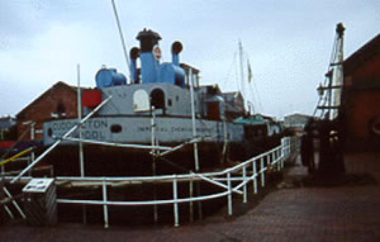 Cuddington in dry dock at Ellesmere Port. Stern from starboard quarter looking forward.