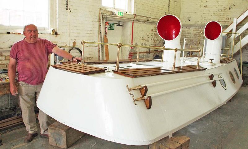 Volunteer Alistair Dilley with the refurbished machinery spaces canopy, 2015