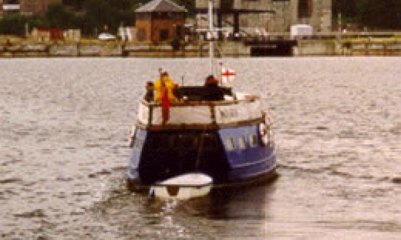 MONARCH - leaving Chatham Dockyard in 1998. Stern looking forward.