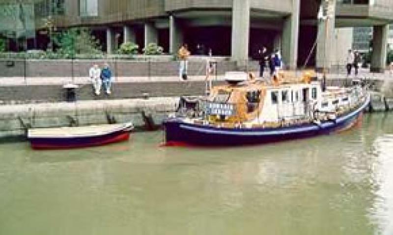 DOWAGER - with tender in St Katherines Dock early 1990s. Starboard quarter.
