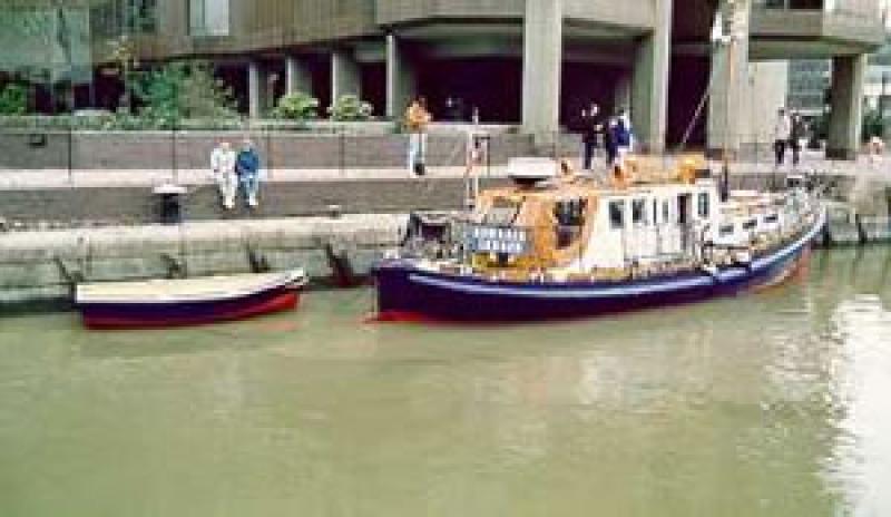 DOWAGER - with tender in St Katherines Dock early 1990s. Starboard quarter.