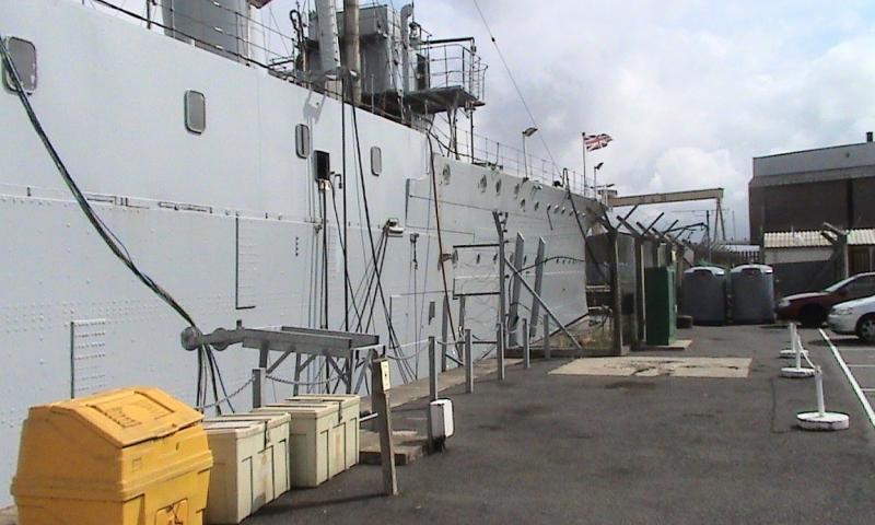 HMS Caroline alongside