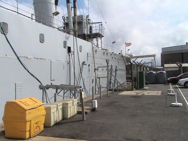 HMS Caroline alongside