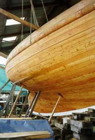 KINDLY LIGHT - at Gweek Boatyard in August 1999. Amidships underwater shape from forward on starboard side looking aft.