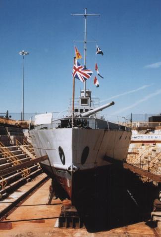 M33 (MINERVA) - in dock at Portsmouth. Bow view.