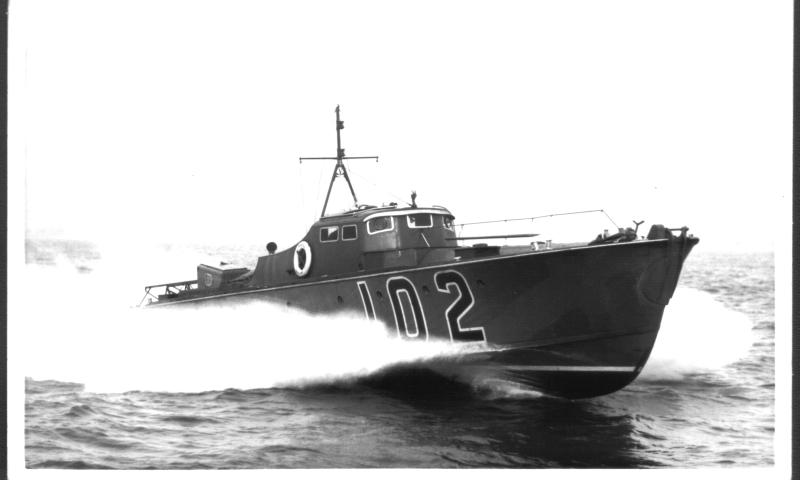 MTB102 late 1937 with bow firing torpedo and stern launching rail at high speed.