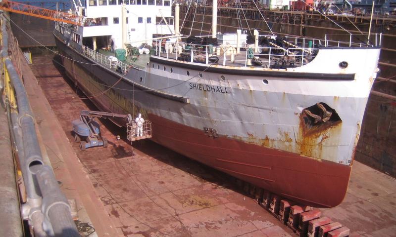 Shieldhall - shows the anti-fouling being applied and is a general view into the dock