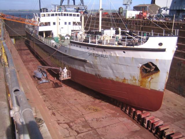 Shieldhall - shows the anti-fouling being applied and is a general view into the dock