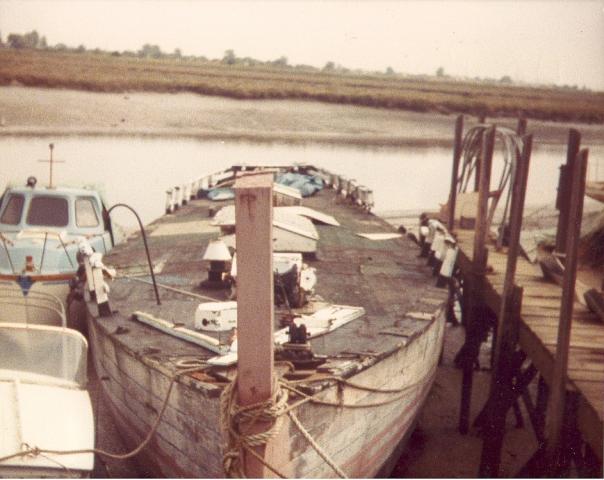 Comus of Wivenhoe without her rig, waiting for restoration