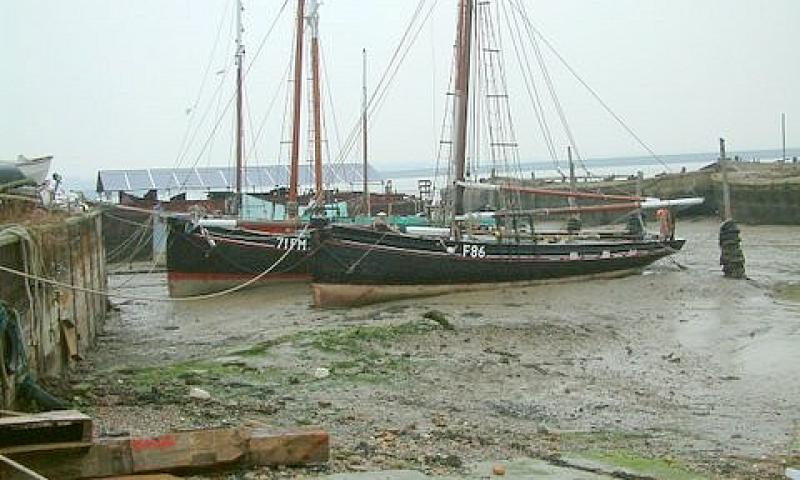 Stormy Petrel in a mud berth - port side
