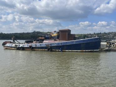 Riverman moored