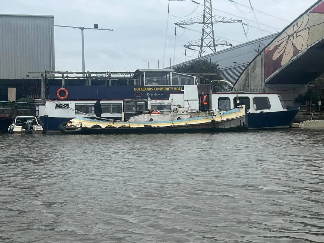 Showery moored alongside a vessel at Cody Dock