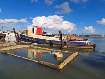 Riverman moored